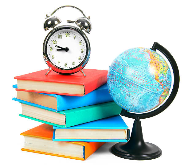 istock Books, an alarm clock and school tools. 510612723