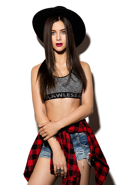 istock Beautiful young woman with long hair posing on wight background 510614570