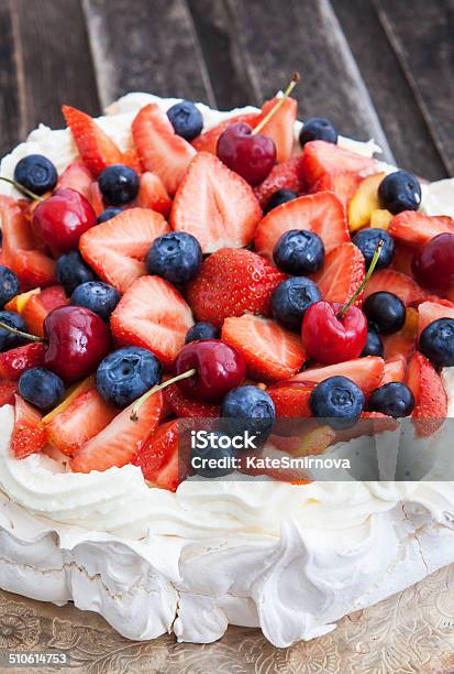 Pavlova Cake With Fresh Berries Stock Photo - Download Image Now - Baked, Baked Pastry Item, Blue