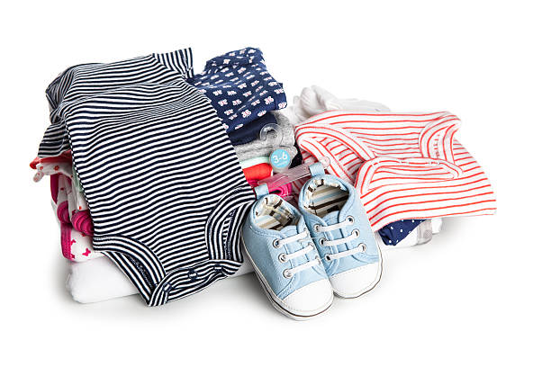 ropa de bebé recién nacido - ropa de bebé fotografías e imágenes de stock