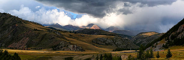 istock beautiful plain on the backdrop of steep mountains in rays 510615619