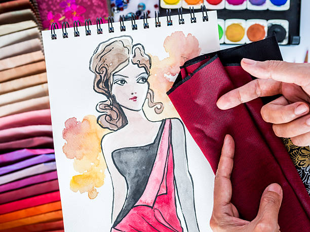 istock Fashion designer working with material sample and hand-drawn illustration 510616623