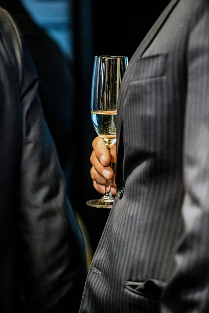 istock businessmen with champagne 510618778