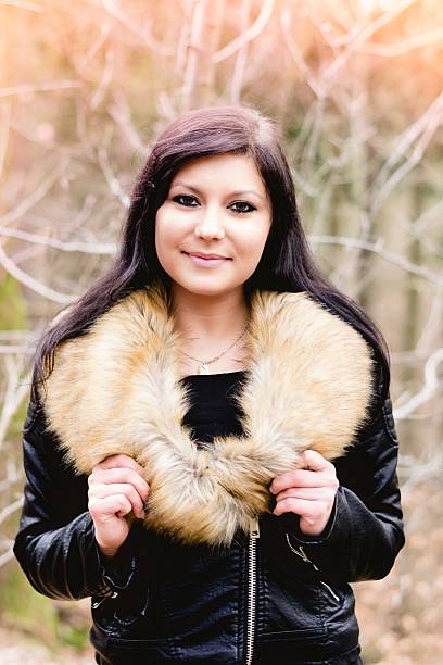 istock young woman with fur jacket VI 510619110