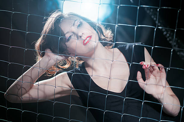 istock studio portrait of a woman mesh netting 510620848