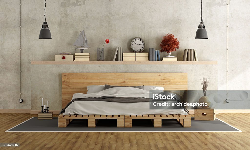 Bedroom with pallet double bed Bedroom with concrete wall, pallett bed and vintage objects on shelf - 3D Rendering Bedroom Stock Photo
