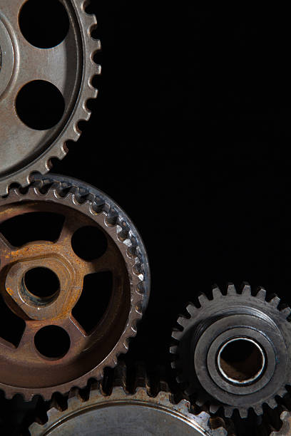 istock Interlocking industrial  cogwheels top view on black background 510622796