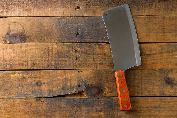 istock Butcher knife on wood background 510625168
