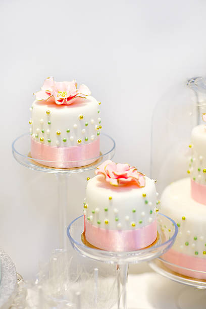 istock Wedding cakes in cream and pink with pearls. 510629866