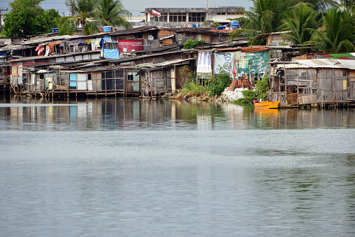 Recife, Pernambuco, Brazil - February 4, 2014: view of the slum along the Capibaribe river
