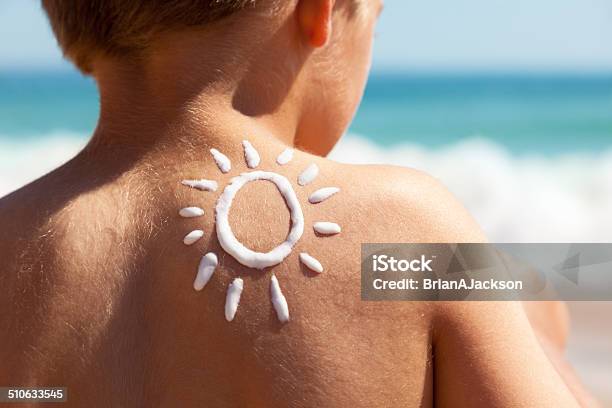 Suntan Lotion At The Beach Stock Photo - Download Image Now - Suntan Lotion, Child, Sun