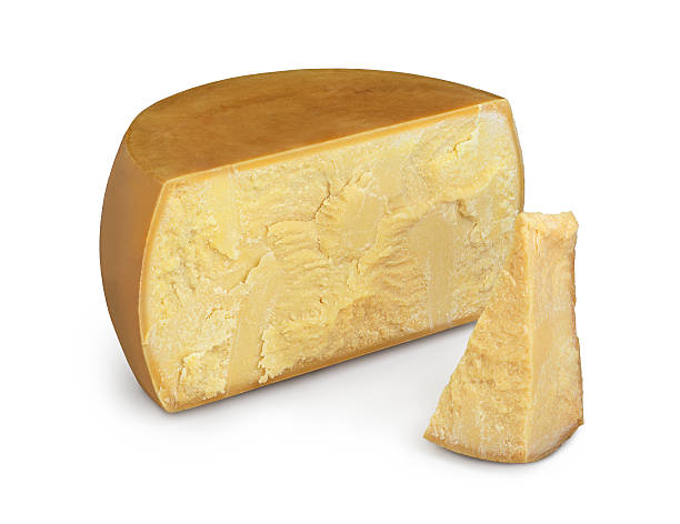 istock Half a parmesan italian cheese ad one piece, white background 510633877