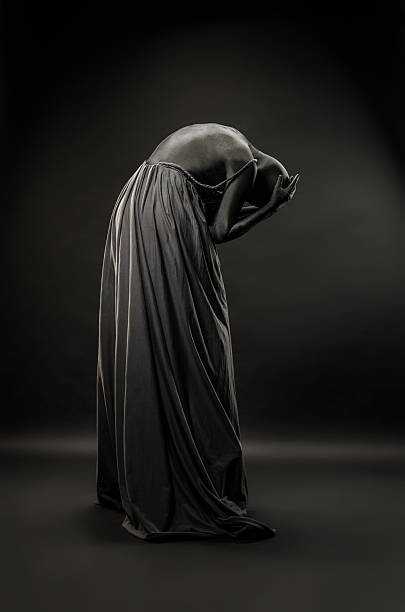 istock Woman in black robes 510634117