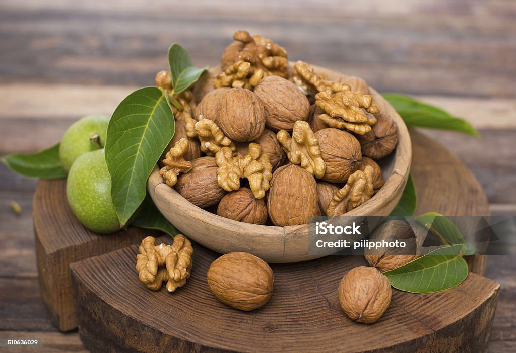 Fresh walnuts in the bowl Basket Stock Photo