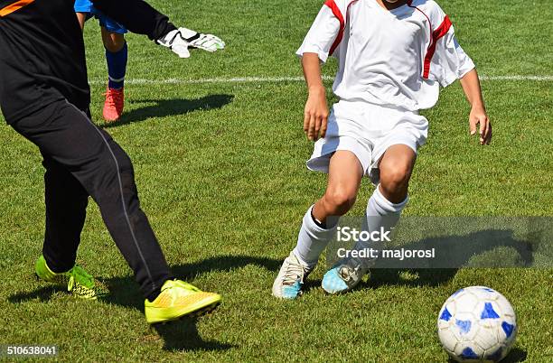 Kid Soccer Stock Photo - Download Image Now - Adult, Adults Only, Athlete