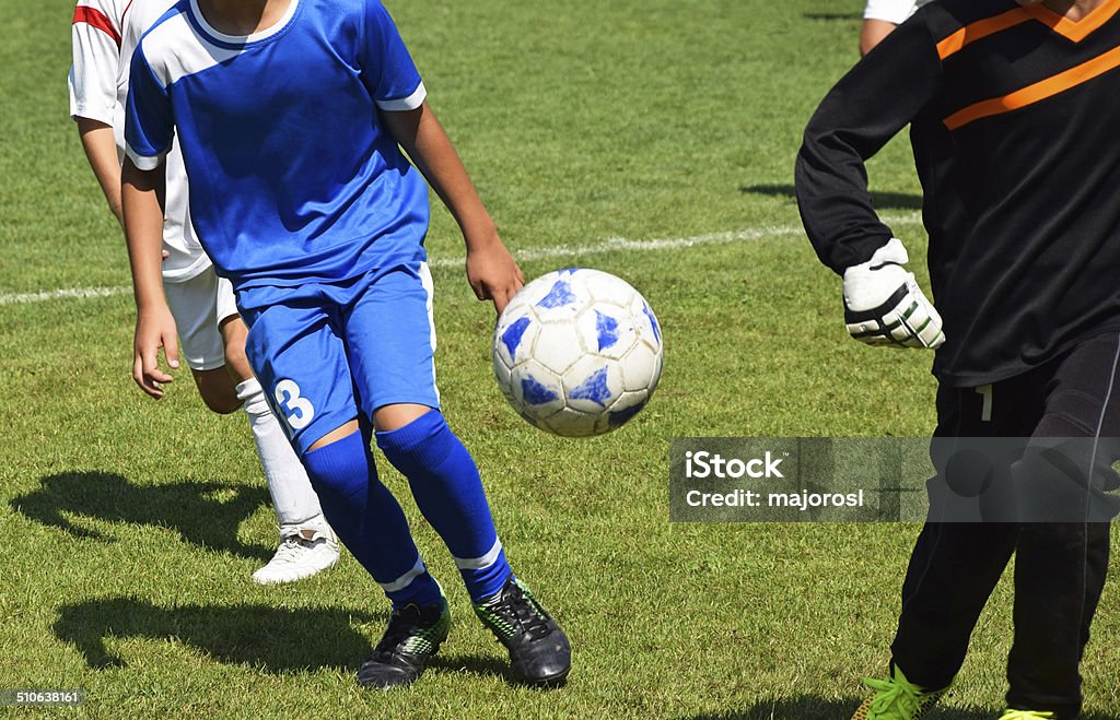 Kid soccer Kid soccer match Adult Stock Photo