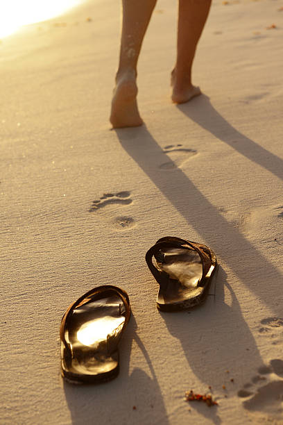 istock man walking on the beach 510639750