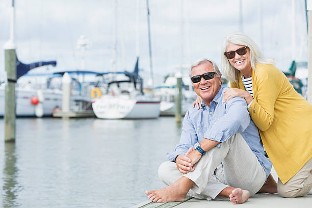 istock Happy senior couple enjoying harbor view 510640252