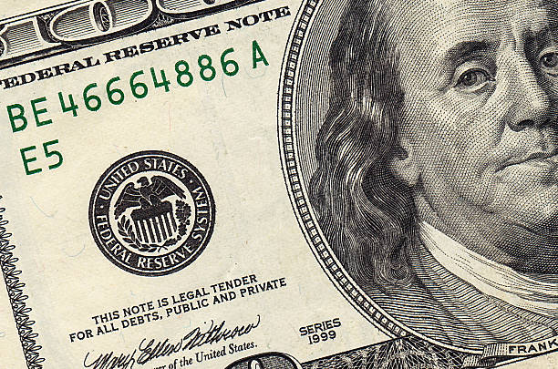 istock Stack of one hundred dollar bills close-up 510641350