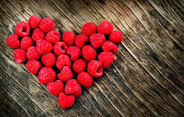 istock Heart shaped raspberries 510641590