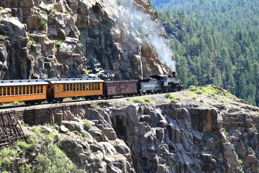 Durango, Colorado, USA - August 12, 2007: The Durango and Silverton Narrow Gauge Railroad train, pulled by steam locomotive number 482, traverses the \