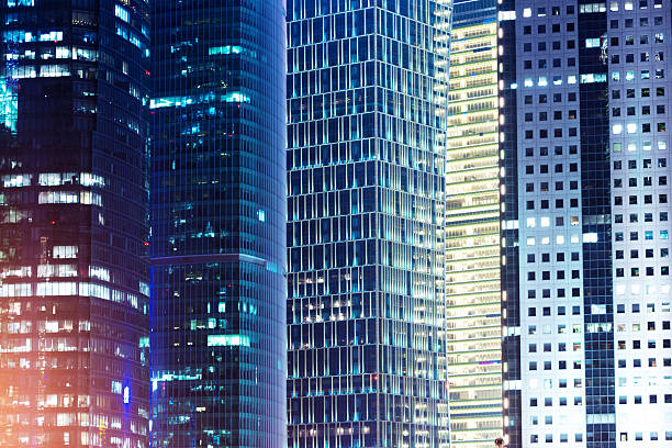 istock illuminated moder city office building exterior 510656179