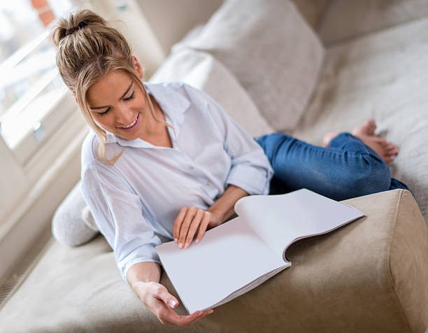istock Woman reading a book 510657323