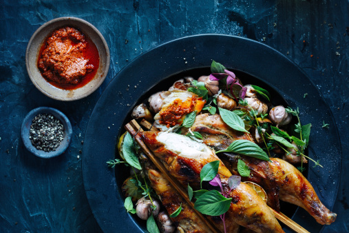 Whole roasted chicken with garlic, lime and herbs