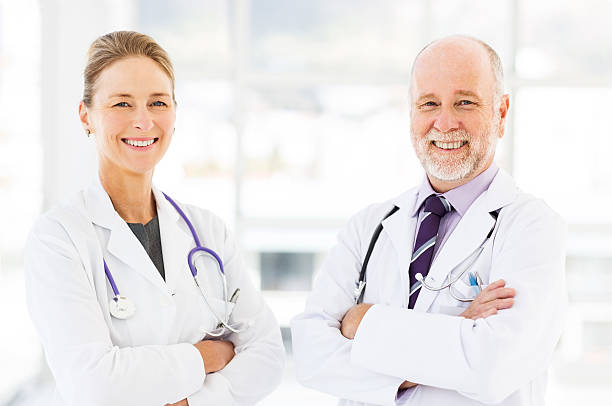 istock Two Smiling Doctors In Hospital 510659865