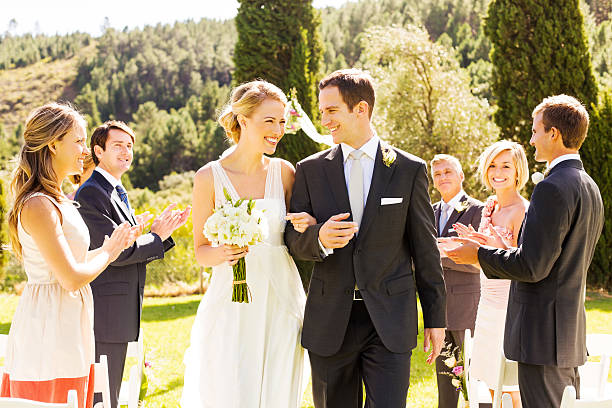 istock Guests Applauding While Looking At Newlywed Couple 510659957
