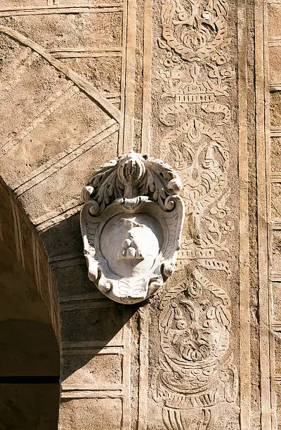 Papal coat of arms on the facade of the Town Hall of Pienza
