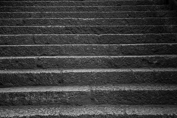 istock Old stone steps leading up a dark alleyway 510674380