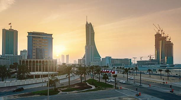 Bahrain Manama City Sunset Manama Financial Harbour Bahrain, Modern business skyscrapers during sunset. Manama City, Bahrain Financial Harbour, Bahrain, Middle East manama stock pictures, royalty-free photos & images