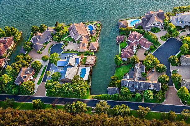 luxury homes, Austin Texas, Colorado River, Mount Bonnell district, aerial Aerial view of Luxury homes on Lake Austin section of Colorado River in Mount Bonnell district in hill country near Austin Texas. Photographed from helicoptter. west lake stock pictures, royalty-free photos & images