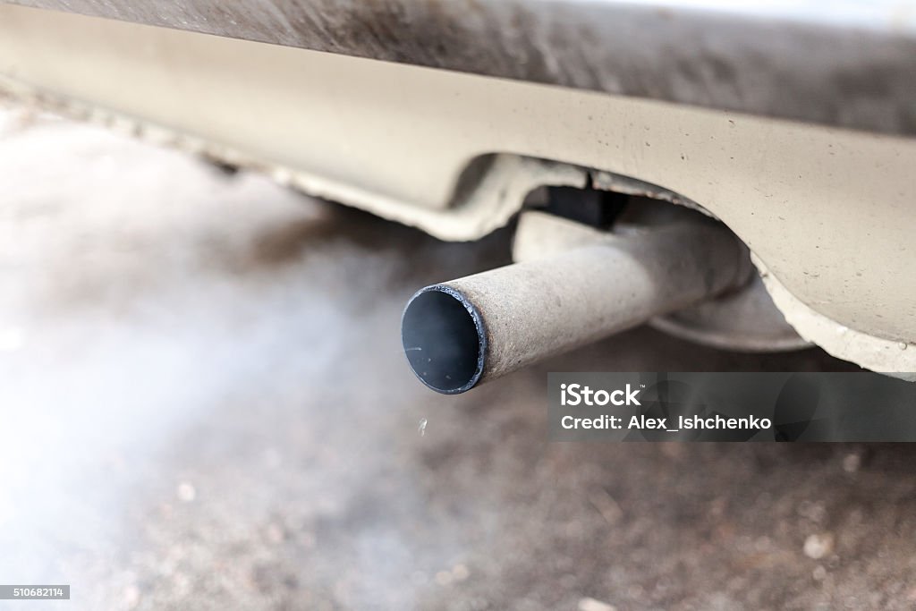 car exhaust pipe Combustion fumes coming out of car exhaust pipe Car Stock Photo