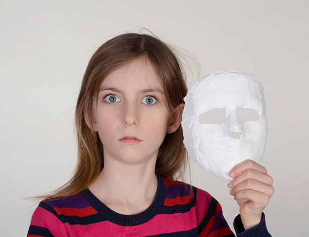 istock girl with plaster mask 510682730
