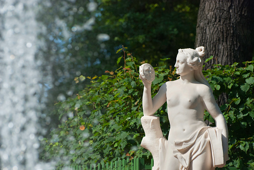 Saint - Petersburg, Russia - July 12, 2014:  Allegory of Truth (Veritas) by Marino Gropelli in The Summer Garden. The Summer Garden - park ensemble, founded by Peter the Great.