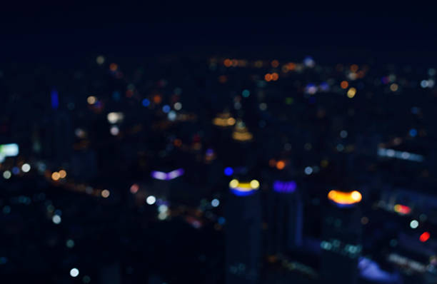 istock Abstract blurred bokeh light city tower background 510684016