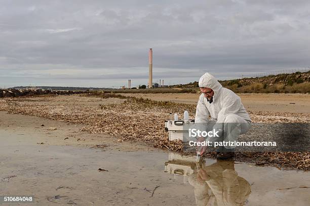 Expert Analyze The Water Stock Photo - Download Image Now - Scientific Experiment, Water, Examining