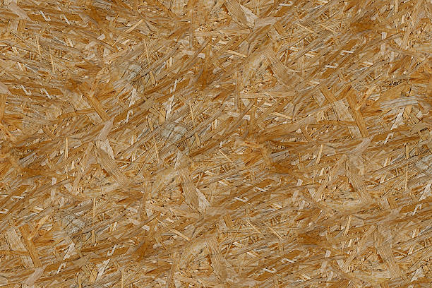istock Pressed wooden panel background, seamless texture of oriented st 510684366