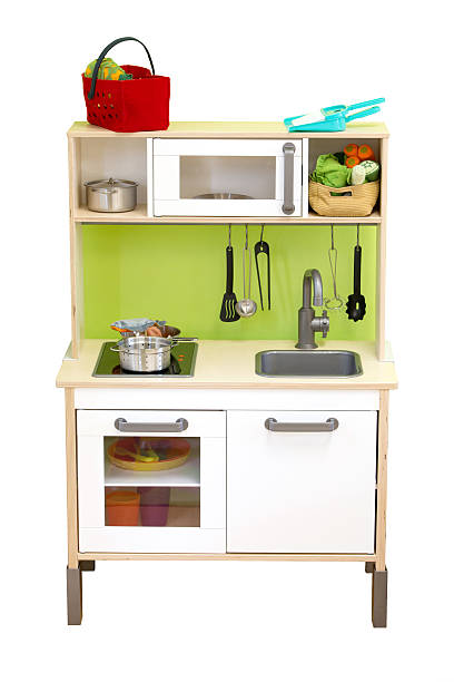 Kitchen toy set isolate over white background stock photo