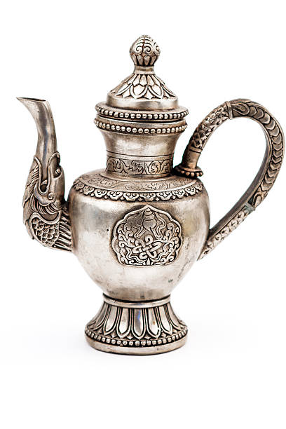istock Antique silver teapot, isolated on white 510687474