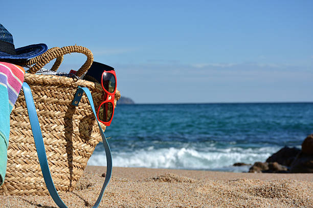 istock Beach bag with a book and  telephone 510687632