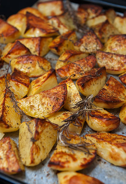 istock Baked potatoes with herbs. 510688264