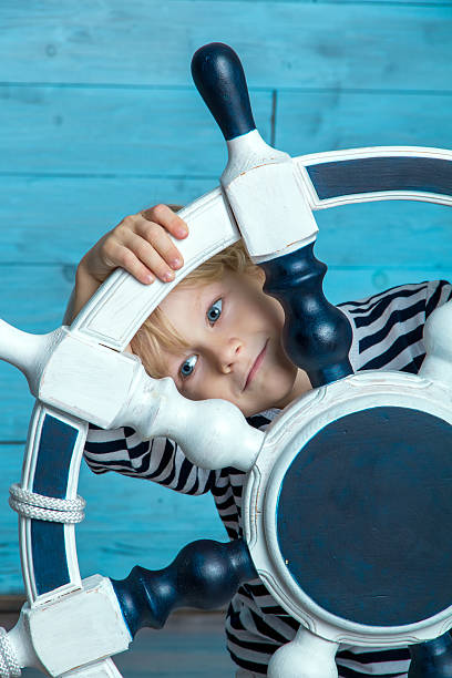 istock child looking through the wheel 510688804