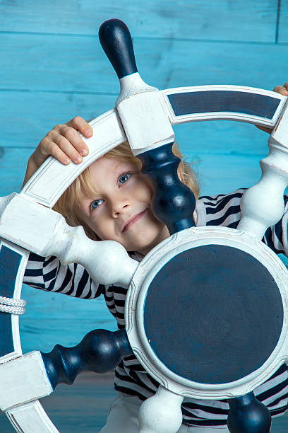 istock child looking through the wheel 510689330