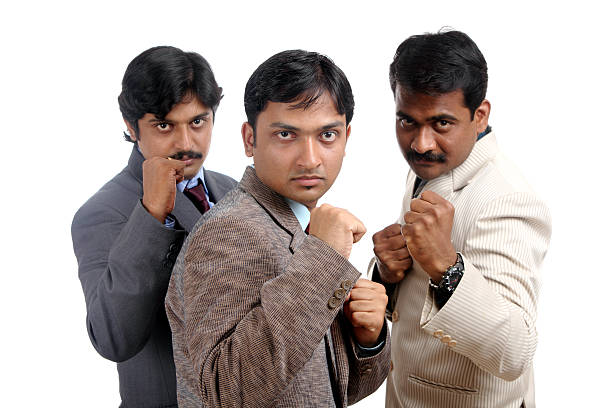 Indian business people posing with anger to the camera