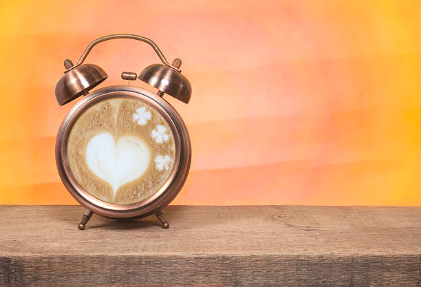 istock coffee time , latte art coffee cup on watch 510692228