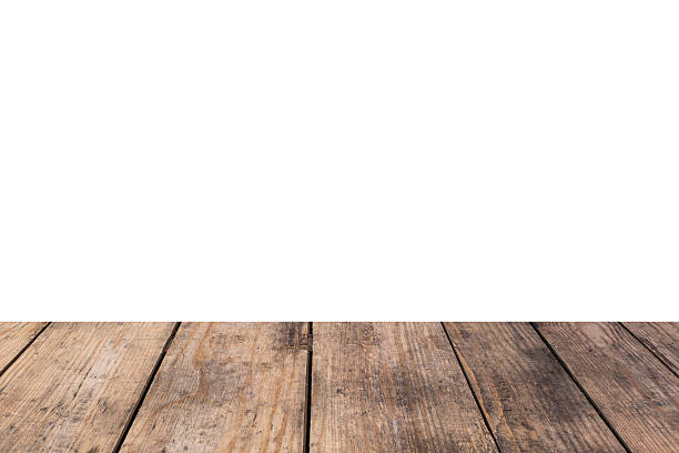 istock Empty top of old wooden table isolated on white background 510695216