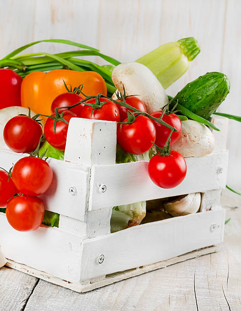 istock Fresh vegetables in a wooden box 510695369